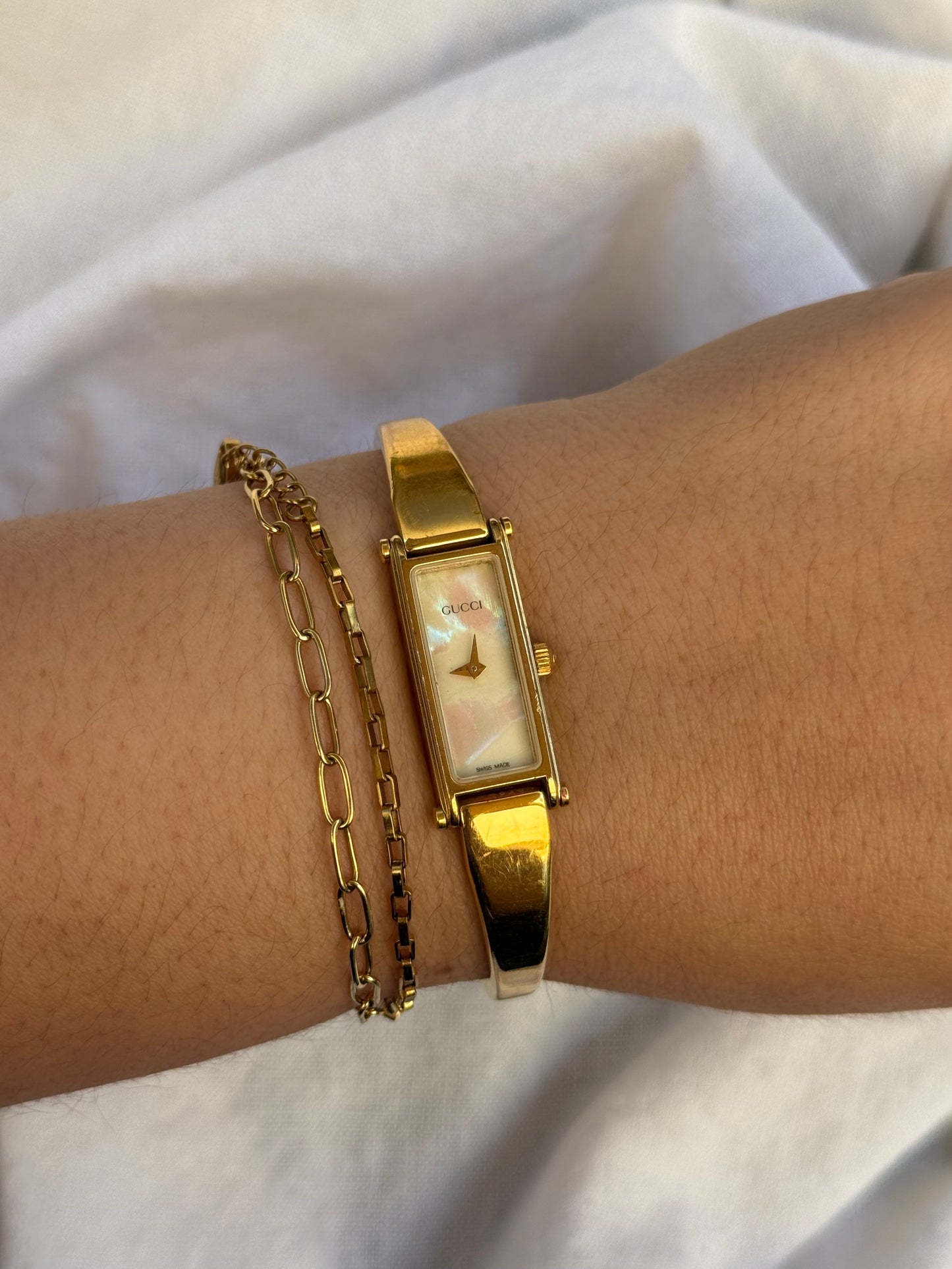 6.5” Gold Mother of Pearl Gucci Watch